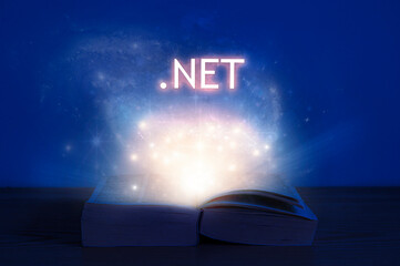 Wall Mural - open book with dot net inscription. light coming from open book with words .net