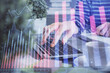 © peshkova - Double exposure of woman hands typing on computer and forex chart hologram drawing. Stock market invest concept.