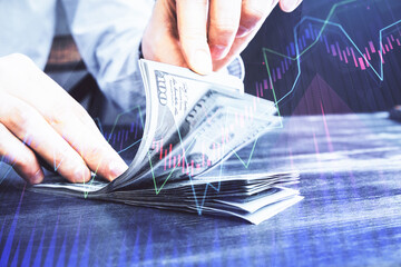 Fototapete - Multi exposure of forex graph drawing hologram and USA dollars bills and man hands. Technical Analysis concept.