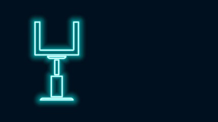 Sticker - Glowing neon line American football goal post icon isolated on black background. 4K Video motion graphic animation