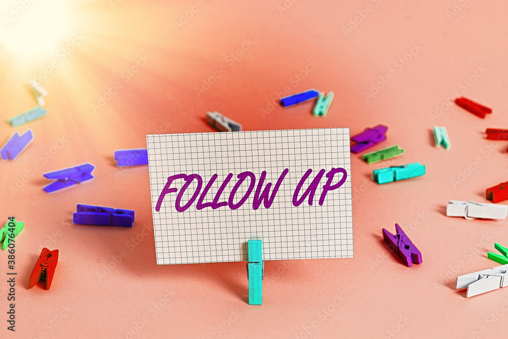Writing note showing Follow Up. Business concept for a continuation of ...