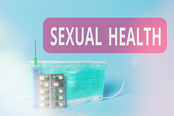 Wall Mural - Writing note showing Sexual Health. Business concept for positive and respectful approach to sexual relationships Primary medical precautionary equipments for health care protection