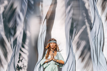 beautiful young stylish woman outdoors portrait with fabric