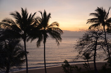 Wall Mural - sunrise over the ocean at Trinity Beach tropical Queensland Australia