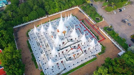 Wall Mural - White Buddhist Pagoda with multiple spires at Wat Asokaram Temple in Samutprakan province, Thailand	