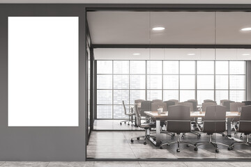 White and gray office meeting room with poster