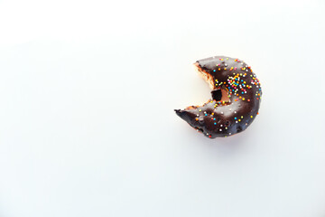 top view of half eaten donuts isolated on white 