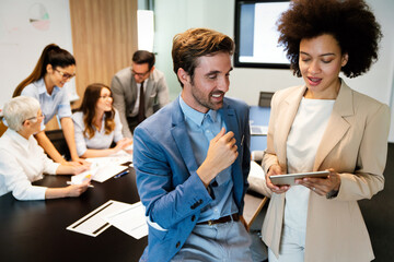 Poster - Portrait of successful business team working in office