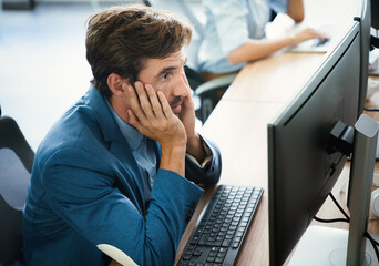 Wall Mural - Young exhausted business man with problems and stress in the office