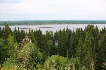 river view with floating barge