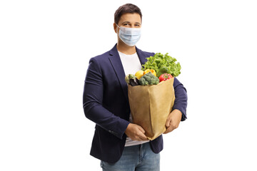 Poster - Young man with a grocery bag wearing a protective face mask