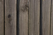 © Sofya - Wooden fence on a Sunny day. Grey wood background