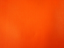 Abstract Background Made Of Bright Orange Fabric