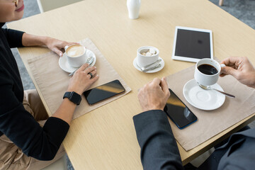 Poster - Hands of two brokers discussing financial news or projects of business company