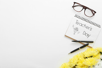 Poster - Beautiful flowers, glasses and notebook with words TEACHER'S DAY on white background, flat lay. Space for text