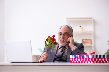 Old man preparing for date at home