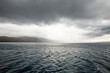 Dramatic image of agitated sea near mountain island, Croatia.