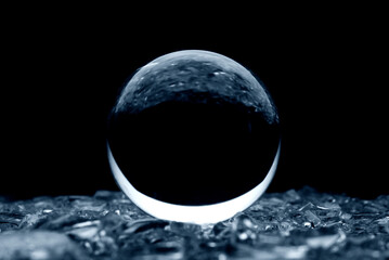 Wall Mural - Abstract glass ball in blue. A crystal ball with blurry pattern. Glass bal in blur.