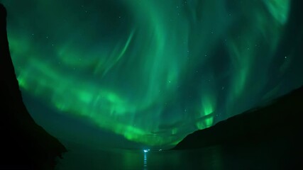 Wall Mural - full sky aurora borealis over ships in steep ford nothern iceland