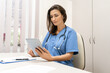 © Stock 4 You - Doctor explaining with patient via tablet computer, mobile health application.