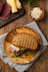 Wall Mural - Ruben sandwich. New York sandwich with pastrami, sauce 1000 islands and sauerkraut.