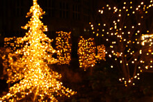 Abstract Background Of Christmas Blurred Defocused Bokeh Street Lights