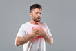 © Prostock-studio - Man with chest pain touching inflammated zone