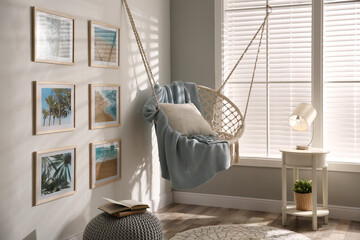 Poster - Stylish room interior with artworks and hanging chair