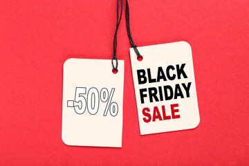 Poster - Sale tag with text Black Friday Sale on red background