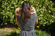 © Carmen Romero - Young woman with her pets, two rabbits