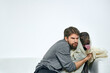 © SHOTPRIME STUDIO - Happy man with dog and light fabric fun scarf friends pet