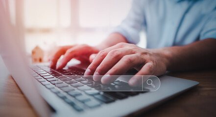 Leinwandbilder - Data Search Technology Search Engine Optimization. male hands are using a computer notebook to Searching for information.Using Search Console with your website.