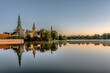 © Stig Alenas - the calm lake of Frederiksborg with reflections of the castle at sunrise