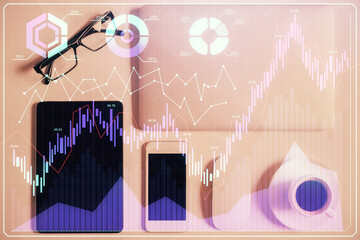 Multi exposure of financial chart hologram over desktop with phone. Top view. Mobile trade platform concept.