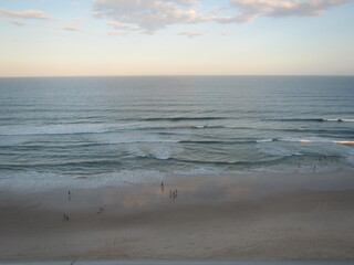 Wall Mural - Sunrise over sandy Main Beach and ocean in Gold Coast Queensland Australia