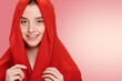 Young healthy girl wearing red shawl on head