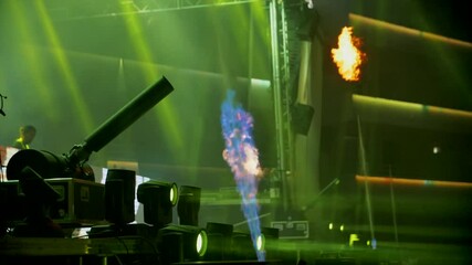 Fireworks exploding on edge of stage at live festival at night - Party pyrotechnics in slow motion - Fire slowmo