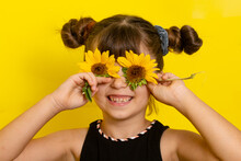 Girl With Yellow Flower