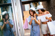 © NDABCREATIVITY - Sale, consumerism, shopping and people concept. Happy young women with shopping bag