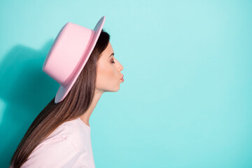 Sticker - Close-up profile side view portrait of her she nice attractive dreamy pretty brown-haired girl copy space sending air kiss amour isolated bright vivid shine vibrant green turquoise color background