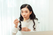 © makistock - Late dinner. Girl eating instant noodles cup buy with great appetite.