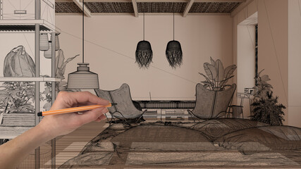 Hands holding pen and drawing on empty modern interior with white walls and parquet, CAD sketch, black ink custom architecture design project. Living room with sofa and armchairs