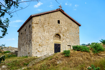 Wall Mural - Building of medieval Greek church of St Demetrius of Thessaloniki inside Genoese fortress, Feodosia, Crimea. Built in XIV century