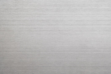 Wall Mural - silver metal texture of brushed stainless steel plate with the reflection of light.