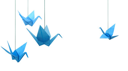 Wall Mural - Blue origami paper cranes haning isolated white