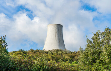 A cooling tower of a geothermal power plant in Monterotondo Marittimo, near Larderello, in Tuscany, Italy