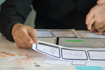 close-up view of young ui development team working together in office