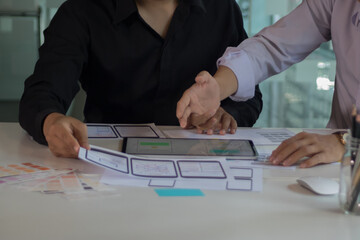 close-up view of young ui development team working together in office