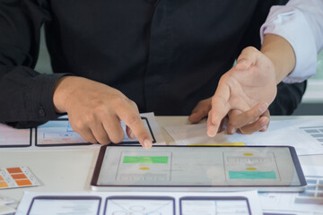 close-up view of young ui development team working together in office