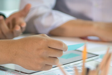 Close-up view of young ui development team working together in office